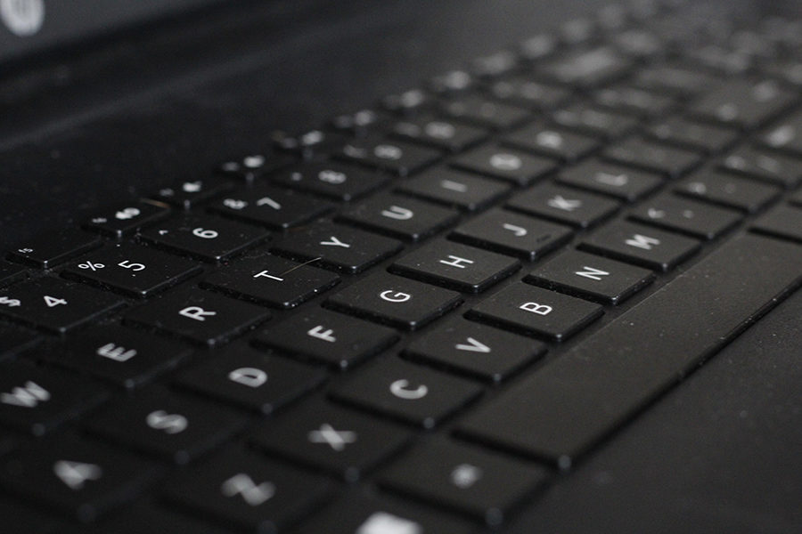 Keyboards of confusion: students struggle with their laptops as the school wifi changes yet again.