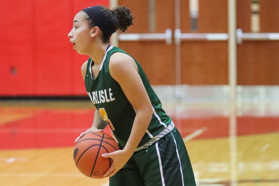 Rachel Bell prepares to pass the ball during a game in the 2017-18 season.  Bell was a freshman last year that played varsity and became even more of an impact player so far this campaign.  