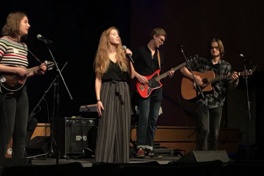 The band Under the Floorboards, including alumni (left to right) Bethany Petrunak, Tali Carlton, Erik Praestgaard, and Sam Blumenthal, performs at the Classic Roast. Although a version of the band still plays at student Coffeehouses, this specific iteration has not performed together for several years.