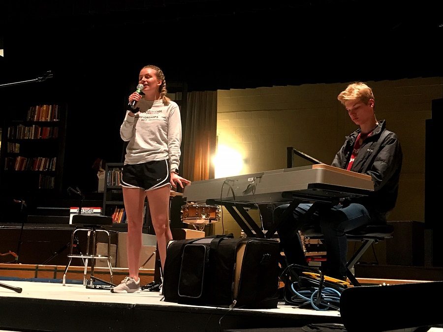 Ashlynn Ashmore, left, and Luke Sheffe audition for the Last Drop. The two will perform together in May, in addition to their other groups.