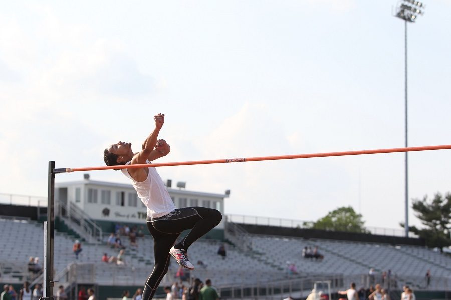 Elijah Ibrahim participates in the high jump during an outdoor meet last season.  He participates in both indoor and outdoor track and field for CHS.  