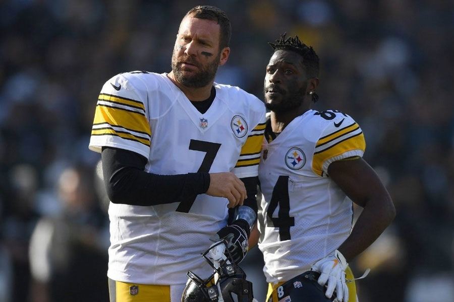 Current Steelers quarterback Ben Roethlisberger and former Steelers wide receiver Antonio Brown watch from the sidelines during a game in the 2018 regular season. A public clash between the two stars resulted in Browns trade to the Oakland Raiders. 