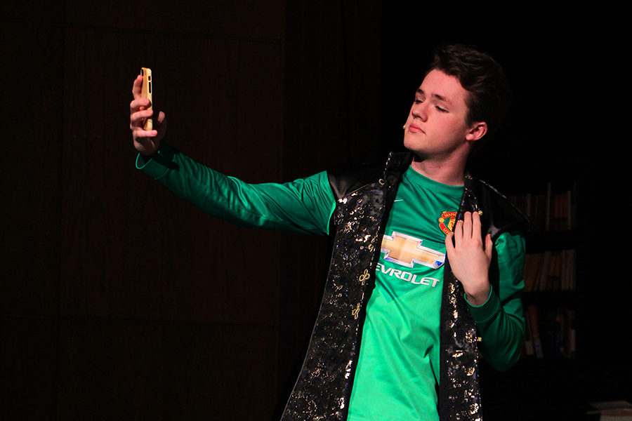 Nick Bowman takes a selfie. His character King pretends not to notice that he has caught the attention of a girl. 