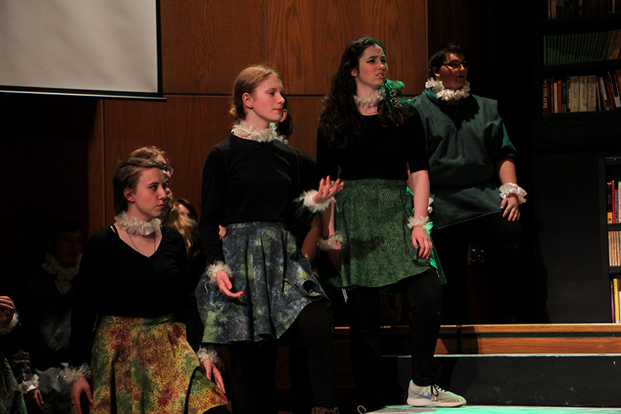 Members of the ensemble recite lines from Loves Labours Tossed. Shakeseares comedy features many chorus lines.  
