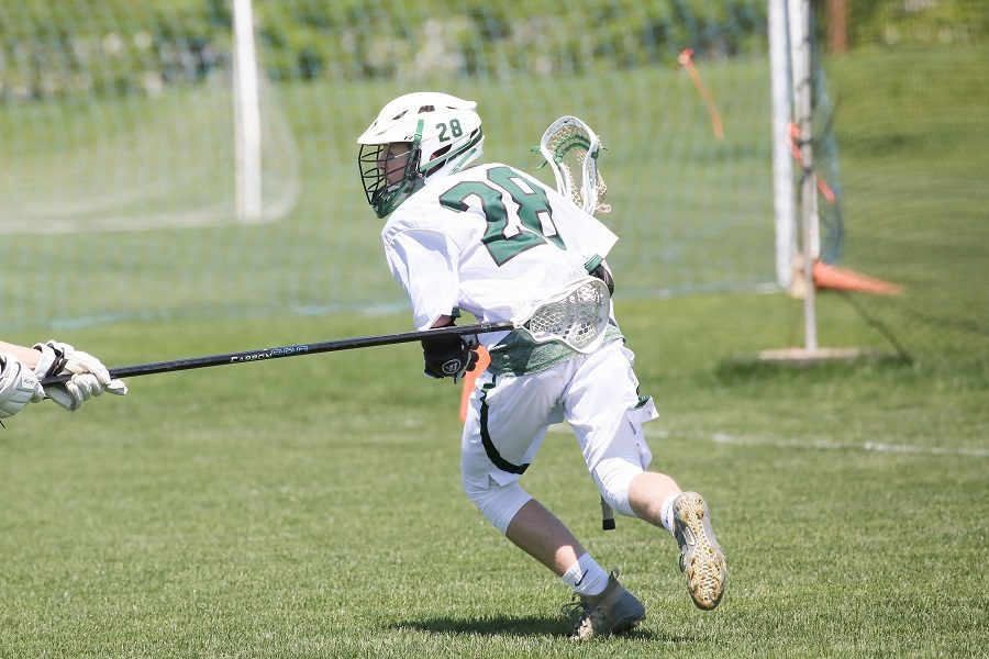 Cameron Fay controlls the ball in a game during the 2019 season. Fay competed on varsity as a sophomore.