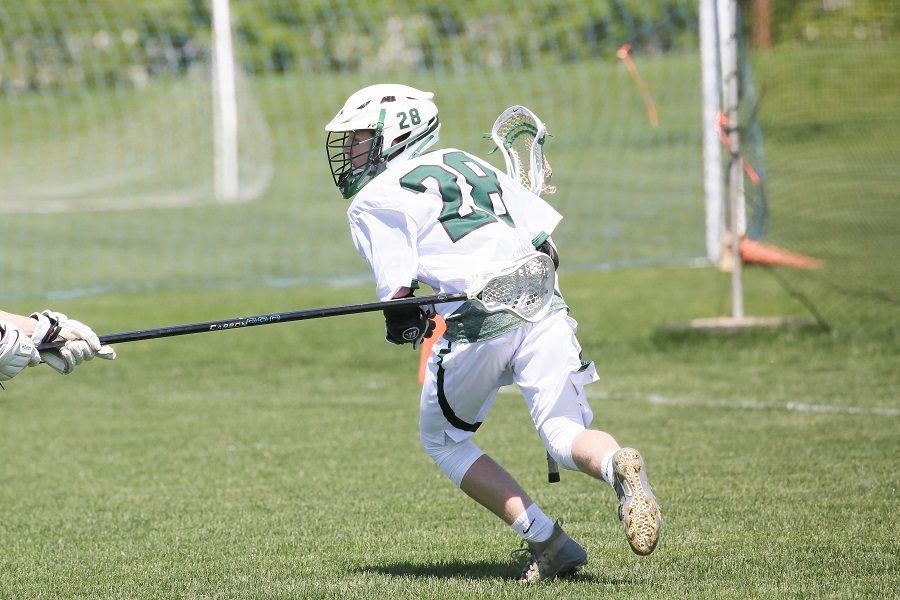 Cameron Fay controlls the ball in a game during the 2019 season.  Fay competed on varsity as a sophomore.