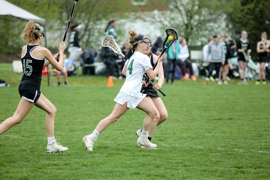 Madison Kelley sprints down the field looking for a goal. This is Kelleys second year on the varsity lacrosse team. 