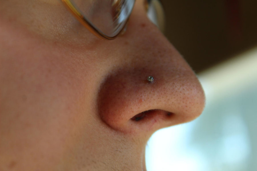 Piercings are a common part of our culture, however some males face back lash for their choice to get them. 