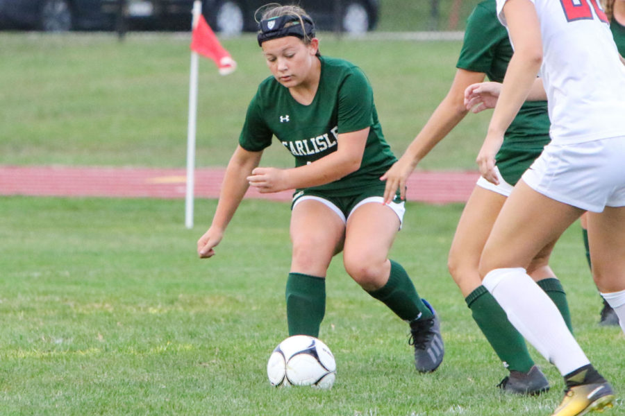 Sophomore striker Alyssa Myers dribbles out of trouble against the nationally-ranked CV Eagles.  Myers had two goals in this historic game, as Carlisle beat CV for the first time in 12 years.