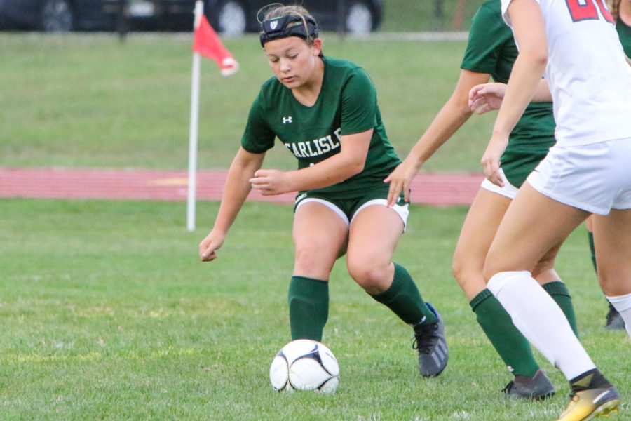 Sophomore+striker+Alyssa+Myers+dribbles+out+of+trouble+against+the+nationally-ranked+CV+Eagles.++Myers+had+two+goals+in+this+historic+game%2C+as+Carlisle+beat+CV+for+the+first+time+in+12+years.