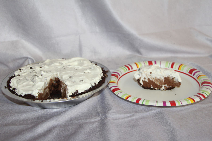 This is the same chocolate whipped pie. The inside is a thick layer of chocolate whipped pudding. The whipped topping helps dilute all of the chocolate-y goodness.