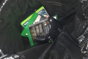 Video games and controller shown thrown in trash, as social media protests can sometimes be directed towards violent video games. 