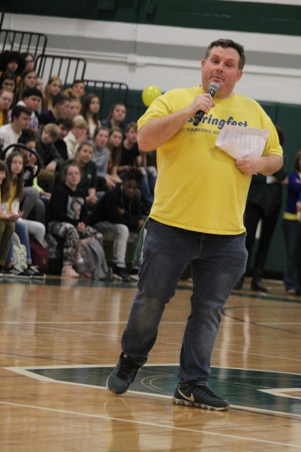 Matt Fahnestock recaps what happened during spirit week, and announces the upperclassmen as winning.  Fahnestock is in charge of student council, that helps to organize spirit weeks and school dances. 