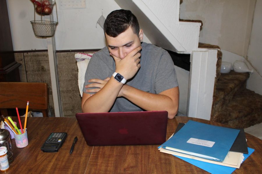 A student works late into the night to finish homework, in order to it to be done on time.  The school district does not have a standard late policy, which can cause the students frustration of having different expectations in each class.  