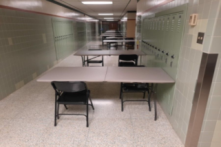 HAVE A SEAT: Tables are set up in the hallways for lunch. This year, students will have to socially distance during lunch, making it harder to socialize, but not impossible.