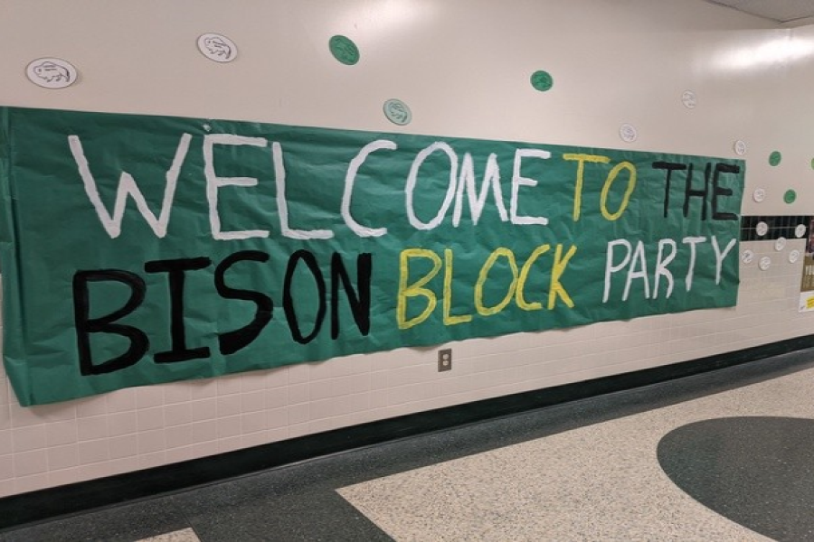 NEW TO THE BLOCK: Even though homecoming looks a lot different than it has in previous years, CHS is still showing school spirit for this years homecoming week, by hanging up decor in the halls, such as this Bison Block Party banner.