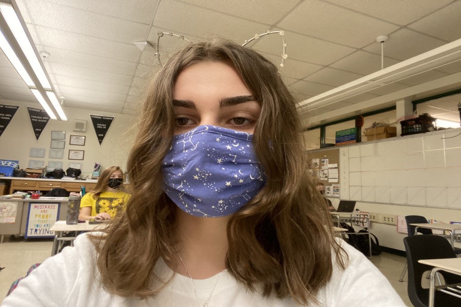 Senior Kathleen O'Neill shows us her out of this world mask. 
