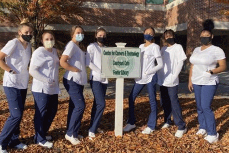 ALL+DRESSED+UP%3A+CNA+students+prepare+for+required+clinical+hours+at+Claremont+Nursing+Home.+Several+students+have+gained+a+new+respect+for+their+jobs+as+they+have+been+working+through+the+pandemic.+