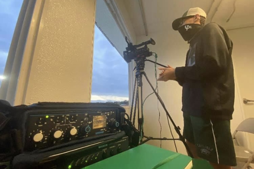 NEW PERSPECTIVES: Carlisle High School junior Austin Shatto adjusts his camera angles in preparation for a Herd TV livestream during the 2020 Football season. Herd TV has also live-streamed Basketball this year and looks to broaden the sports being streamed in the future. 