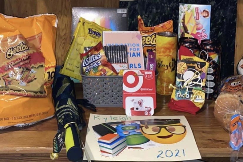 BASKET+OF+ABUNDANCE%3A+CHS+senior+Kyleigh+Zenewicz+shared+this+snapshot+of+the+gift+basket+she+received+from+her+sponsor.+Community+members+look+to+fill+the+baskets+with+the+seniors+personal+favorites%2C+in+hopes+of+a+lasting+memory.