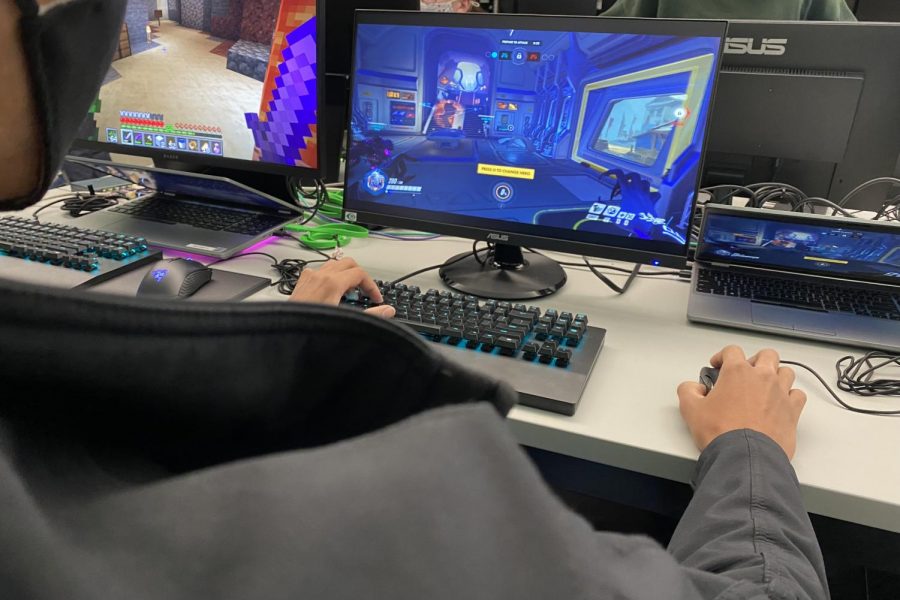 GAME ON: CHS senior Aiden Moyer readies up for another game at the esports area in L127. New to CHS this year, the esports team hopes to expand in numbers and opportunities in future years.