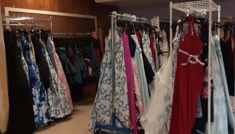 ONE BY ONE: This is an overview of the front racks of 200 dresses that Jessicas Closet had donated to them by Macys.  Jessicas Closet works to get dresses into the hands of high school students that may not be able to afford them. 