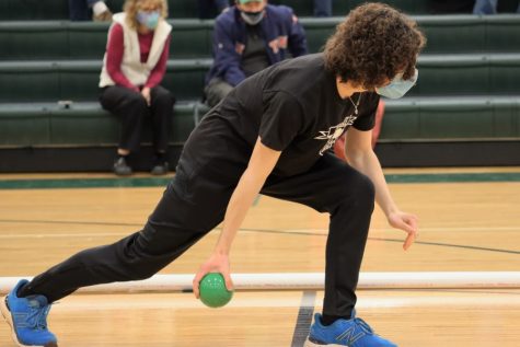 BEHIND THE LINE: Alex Ftohidis gets ready to roll his ball for the Carlisle team during the match against Cumberland Valley. The match was held on Tuesday, February 15. 