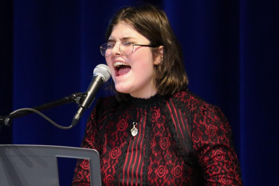 MASTER SHEFFE: Ashley and her sister Emily (not pictured) perform at the Winter Coffeehouse in March 2022. Ashley credits her family for inspiring her music career.