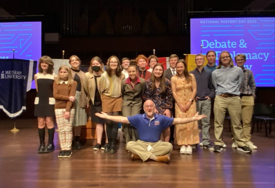 MAKING HISTORY THROUGH HISTORY: Students and adviser Kevin Wagner celebrate success at the Region #8 Regional History Day at Messiah University on March 19. After doing so well that they even swept three whole competition categories, they will all move onto the State History Day competition on May 7-8 at the University of Scranton. 