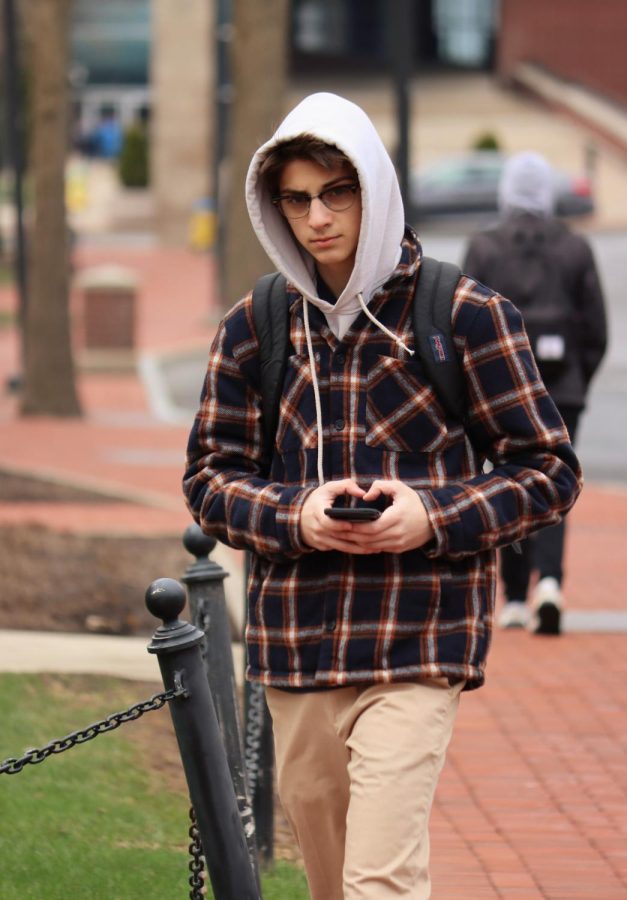 Prolonged Eye Contact: Penn State University student catches staff photographer in action.