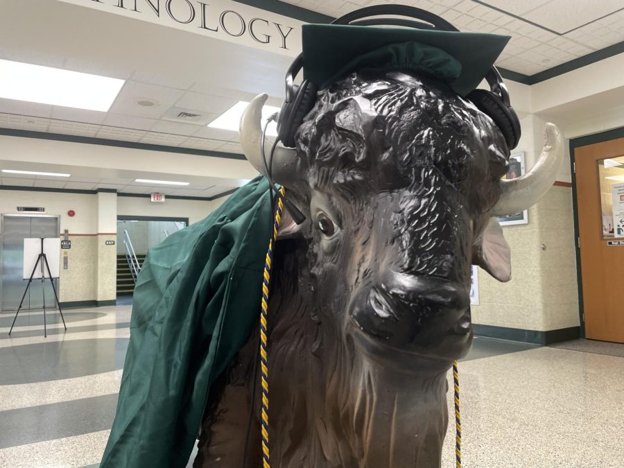 THUNDERING BISON BEATS: CHS mascot, Thor, sports the classic graduation attire and his very own set of headphones to check out our class of 2022 senior soundtrack. Check it out on Spotify (@chsperiscope).