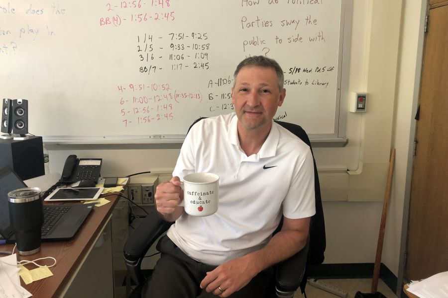 BIGGEST COFFEE ADDICT: Mr. Henry
Hes always teaching with his cup in his hand and taking short breaks to take a sip. - Senior Ashlynn Zimmerman