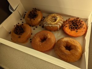 SWEET SIX: Six of the doughnuts from Periscopes order some include Strawberry shortcake, Chocolate covered Cherry, French Toast, and Cinnamon Bun. Crazy Glazed offers 28 different flavors of warm pillowy doughnuts and are definitely worth the try!