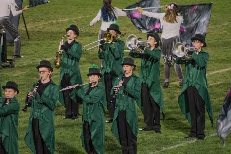 Band members performing their show at the homecoming football game.
Photo taken by Erin Markan and edited by Kirsten Bisconer.