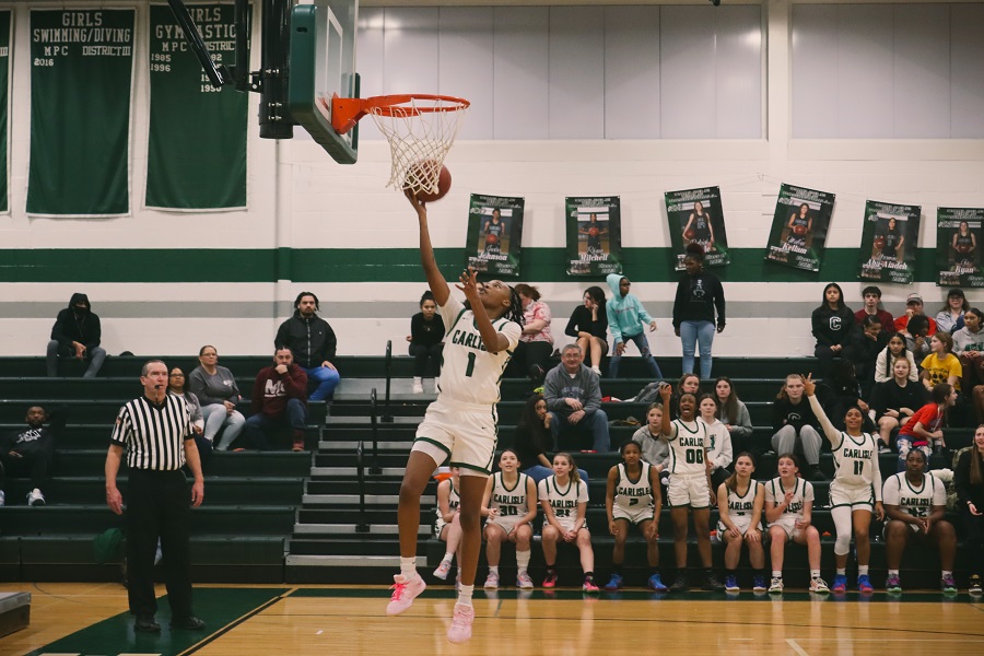 NOTHING BUT NET: Rhyan Mitchell goes in for a layup on Friday night against CD East. 