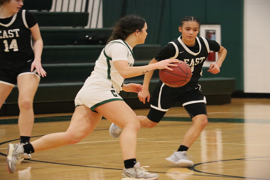 GET YOUR HEAD IN THE GAME:  Yasmine Abu-Aiadeh dribbles the ball past a CD East defender on Friday. 