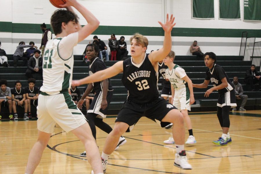 Harrisburg's #32 attempts to block 