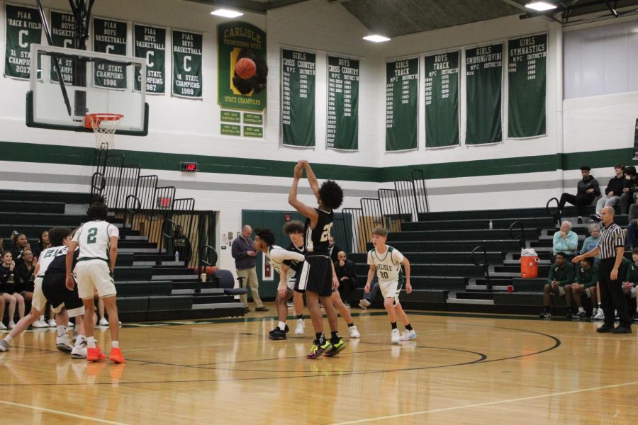 Harrisburg's #20 shoots for the extra point
