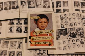 Phuc Tran's book among a plethora of Carlisle High School Yearbooks. 