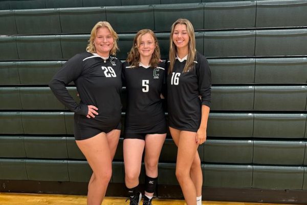 SET IT UP: Captains Emily Sheffe (Left), Cassie Diehl (Center), and Amelia Morris (Right) strike a pose in their uniforms during preseason.