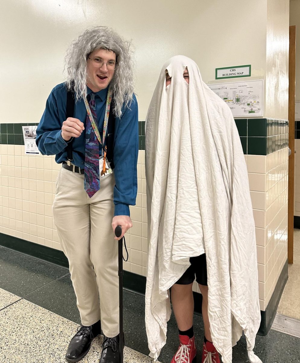 Nursing Home or Funeral Home? Sophomore Thomas Brown (right) poses with Mr. Parker (left) as the grim reality of Parkers costume. 