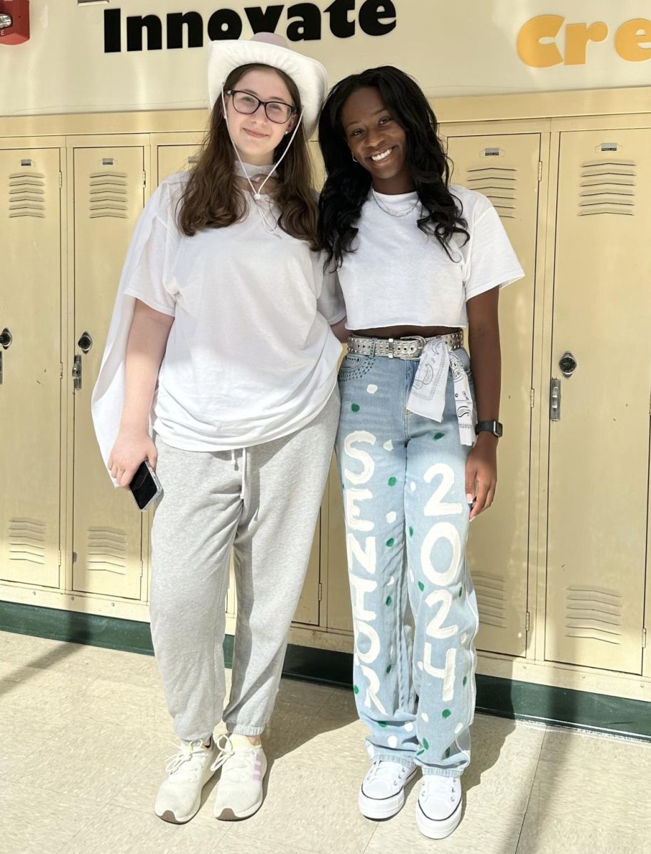 Senior Class Council members Lia Thomas (left) and Camryn Nelson (right) are all decked out in 2024s class color.