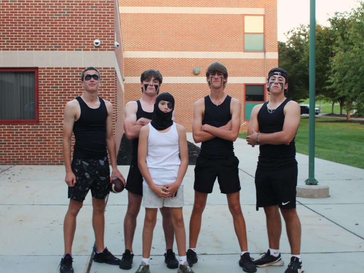 Team Dodge My Ball looking tough outside the school.