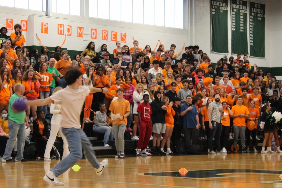 DODEBALL DANGER: The only remaining student-team player, Cohan Bailey, hurls a dodgeball at the teacher's team hoping for a comeback.