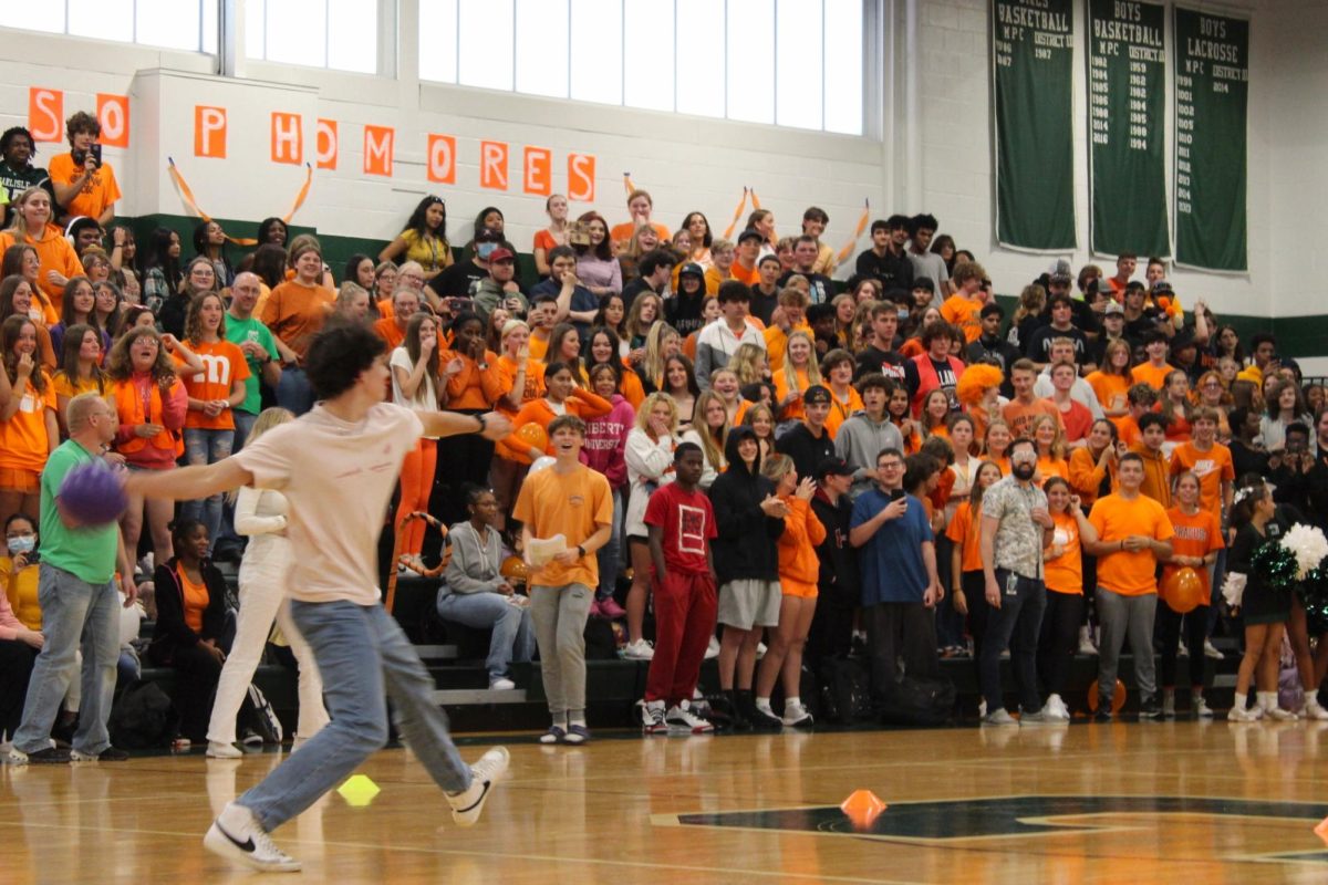 DODEBALL DANGER: The only remaining student-team player, Cohan Bailey, hurls a dodgeball at the teachers team hoping for a comeback.