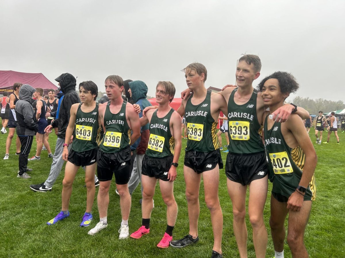 NEVER BACK DOWN, NEVER WHAT?: Never give up! The boys push through their race in the pouring rain.