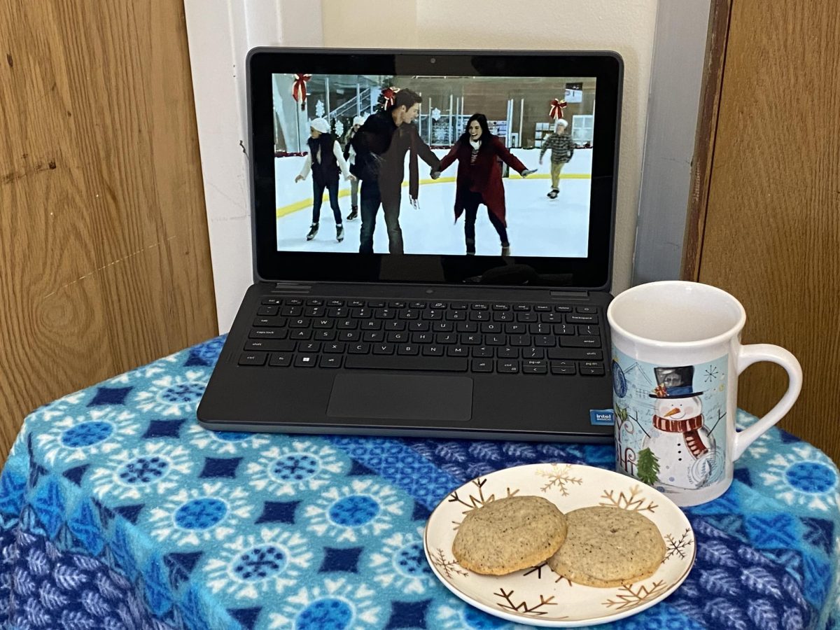 HOLIDAY CHEER: The two main characters from Hallmarks 2015 movie, 12 Gifts of Christmas, grow closer together through ice skating. 