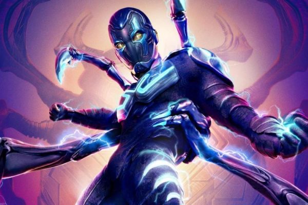 CYBER FUTURE: Xolo Maridueña, as Blue Beetle, showcases the character's futuristic neon tech-suit in this promotional art. The suit plays a key part in Beetle's superpowers, as explained by his Uncle Rudy in the film; "The universe has sent you a gift, Jaime. And you have to figure out what you’re going to do with it"