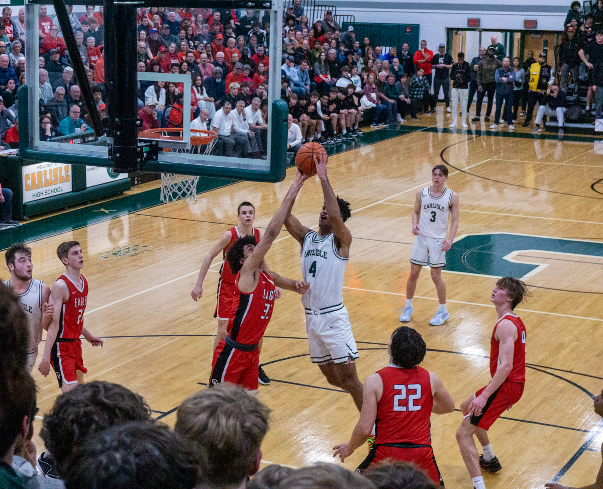 Jaydon Smith flies down the key for a floater.