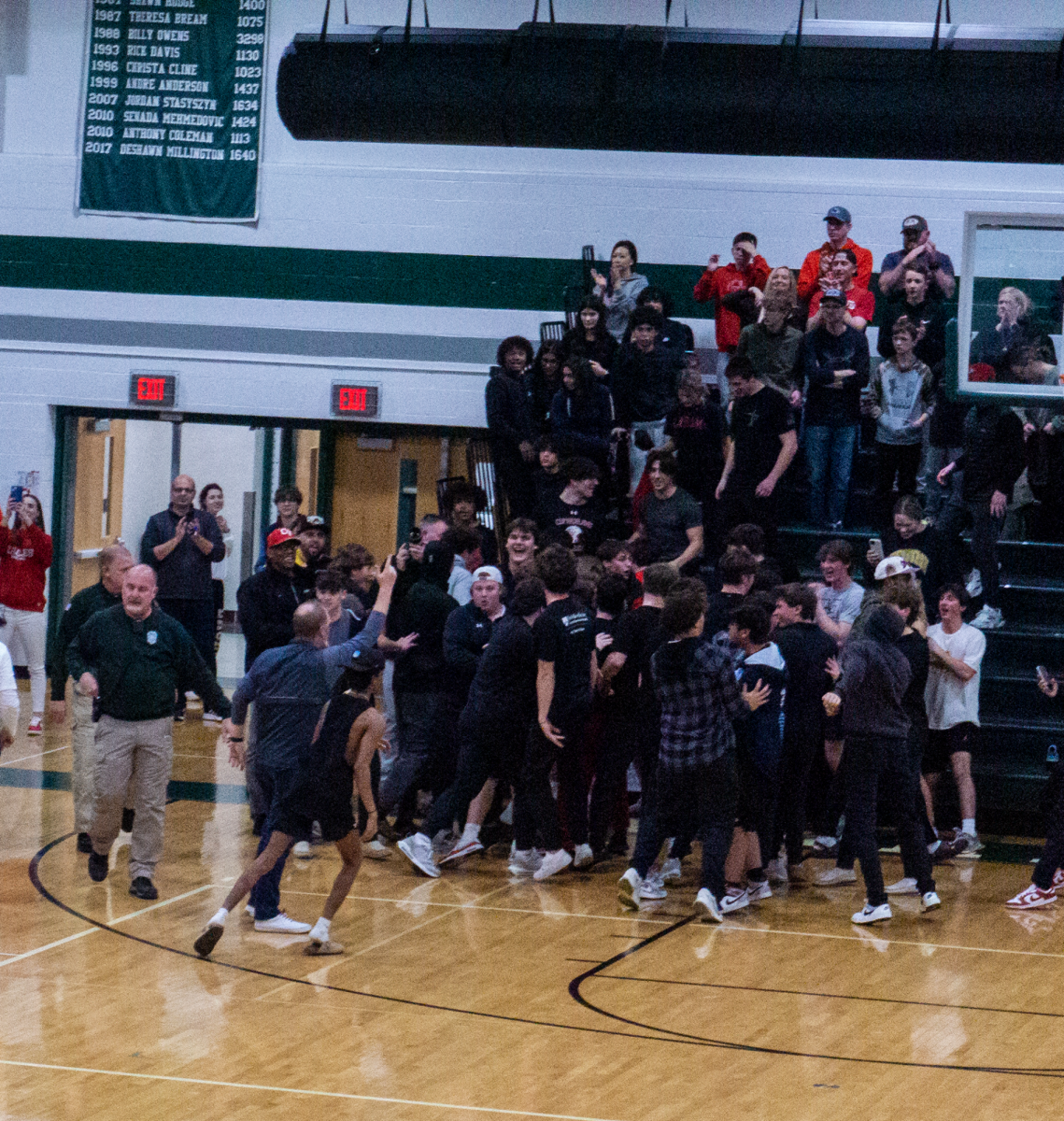 CV students storm the court after the win.